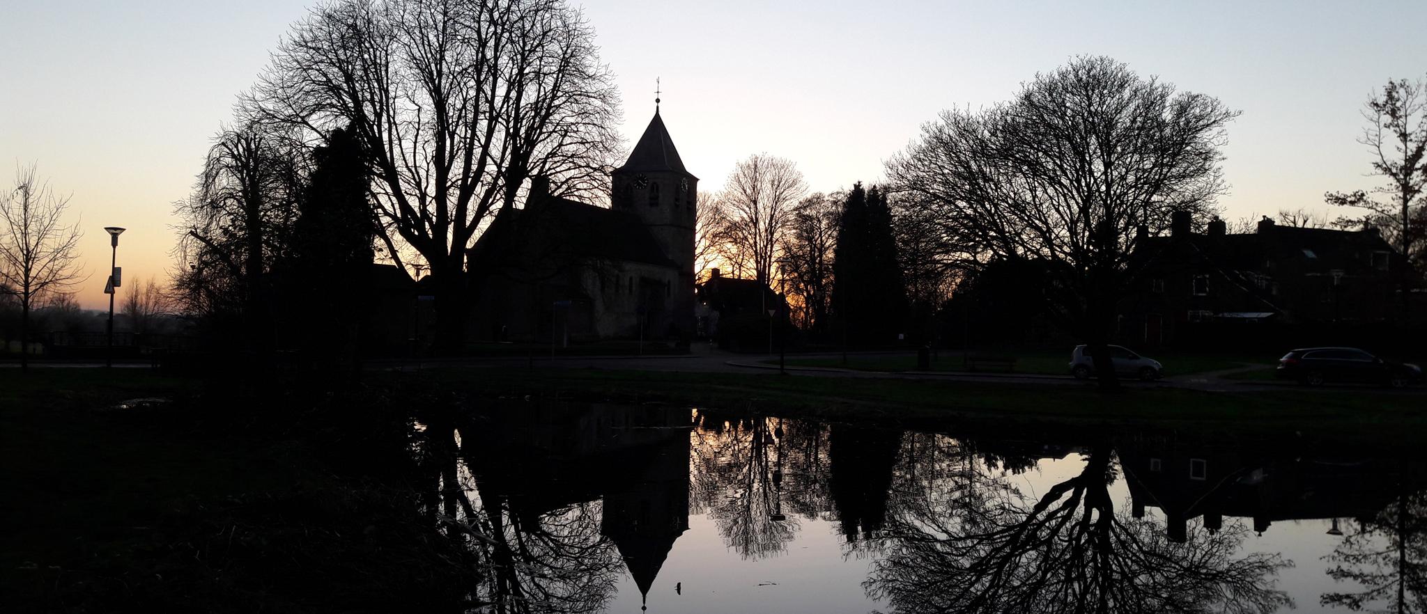 Sunset at Oosterbeek. The protestant church in the centre is one of the oldest in The Netherlands.